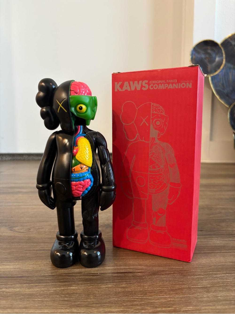 KAWS Companion Figure - Black with Green, Pink, Yellow, Blue Interior